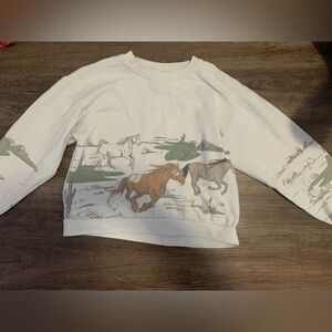 A horse sweater with neutral colors from target.